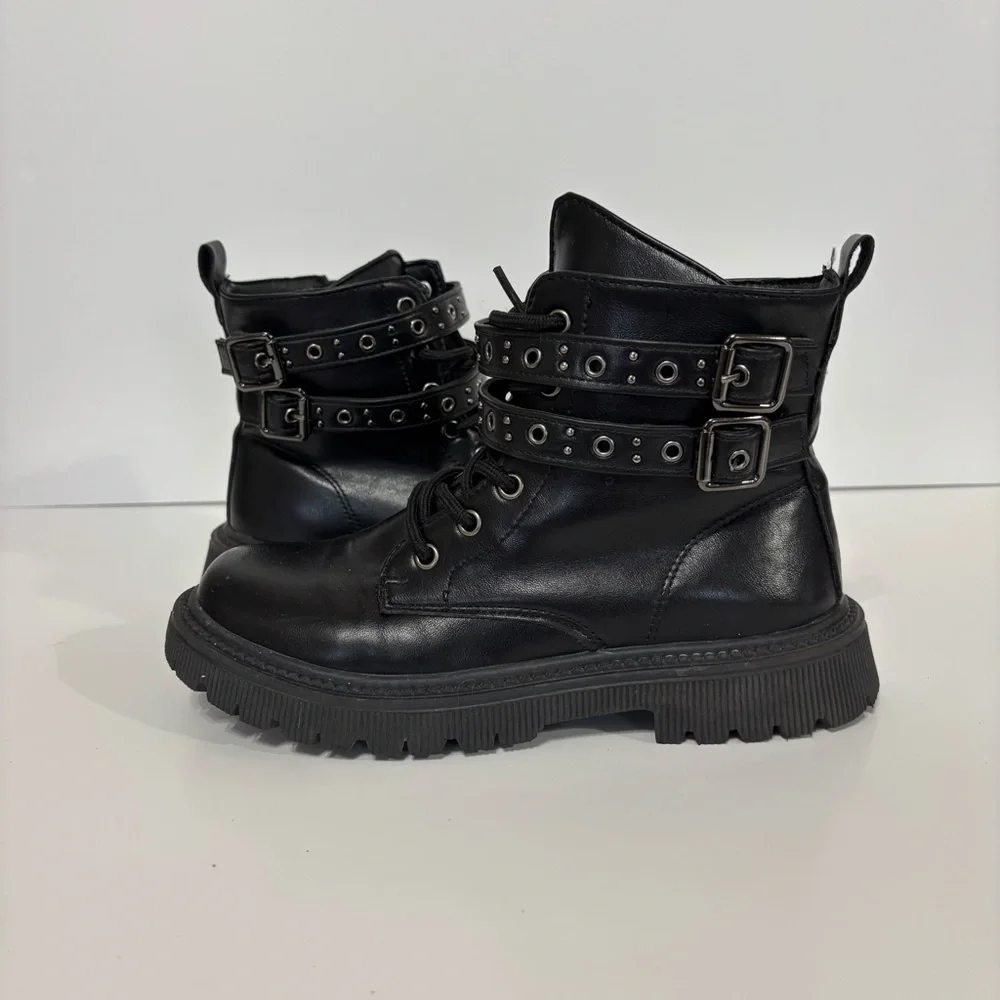 Women's Black Leather Combat Boots with Studded Straps